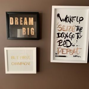 Three framed photos